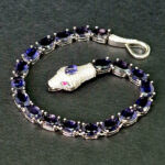 Браслет "Хозяйка медной горы", камни танзанит, корунд, рубин, Арт. НГ-12744