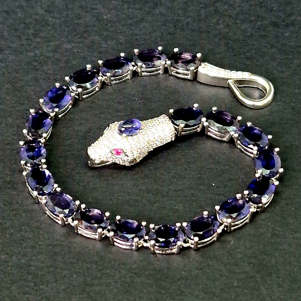 Браслет "Хозяйка медной горы", камни танзанит, корунд, рубин, Арт. НГ-12744